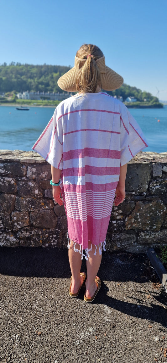 Beach kimono with twisted fringe finish. Fuchsia