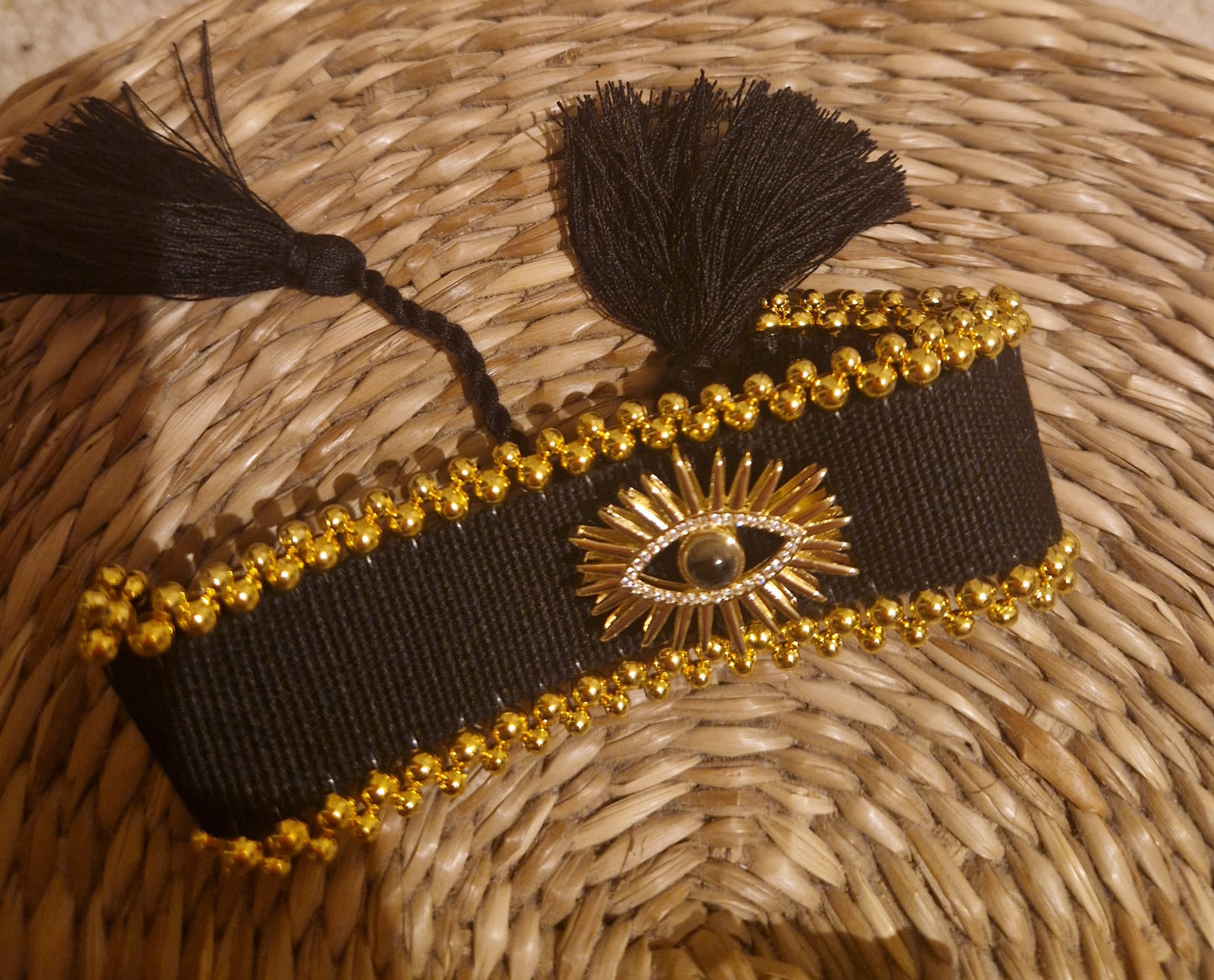 Boho, black and gold tasseled bracelet